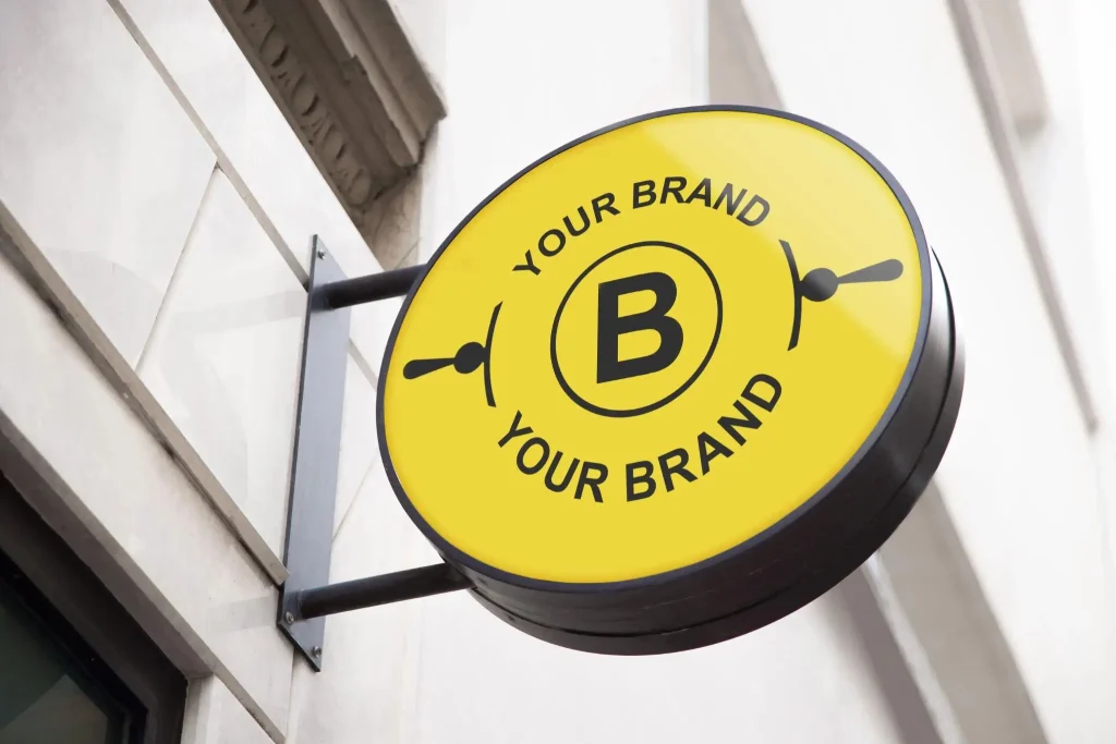 Mockup logo brand pada papan nama toko.